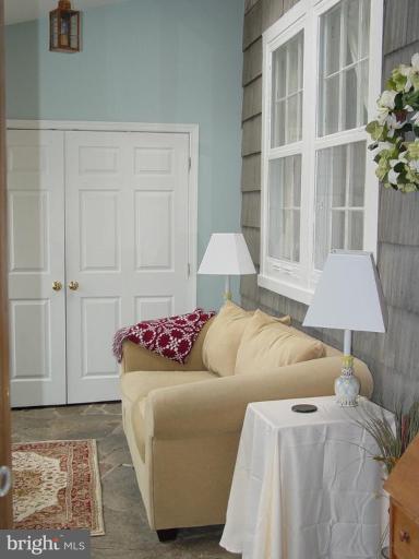 7007 Copeleigh Road Baltimore, MD 21212 - Photo 1 of 30 a living room with furniture and a window