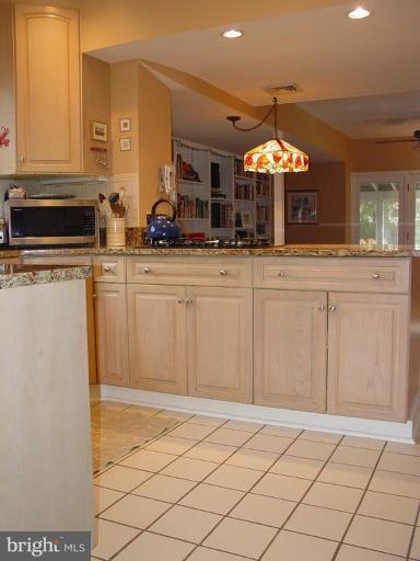 7007 Copeleigh Road Baltimore, MD 21212 - Photo 14 of 30 a kitchen with a sink and cabinets