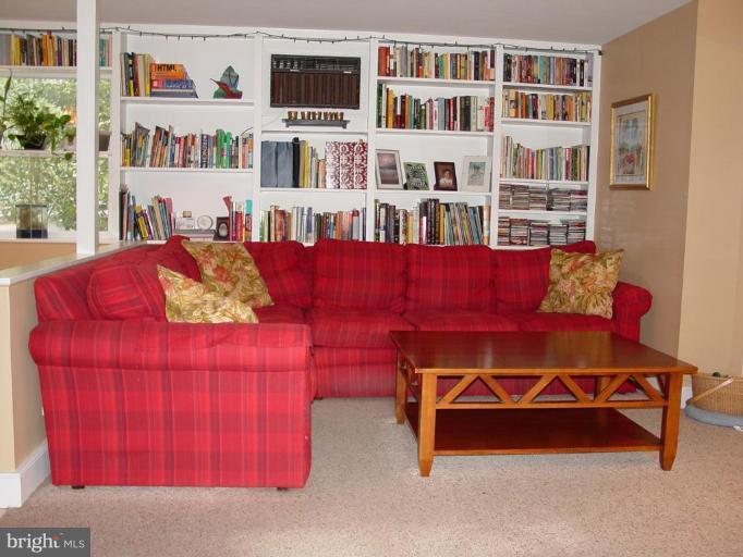 7007 Copeleigh Road Baltimore, MD 21212 - Photo 20 of 30 a living room with furniture and a book shelf