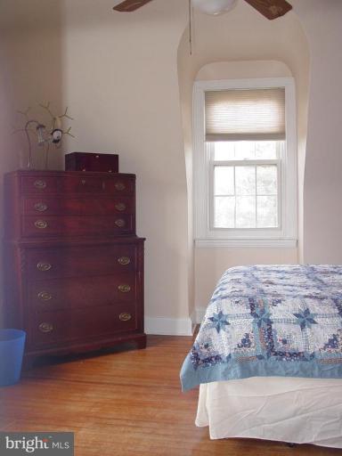 7007 Copeleigh Road Baltimore, MD 21212 - Photo 21 of 30 a bedroom with a bed and a window