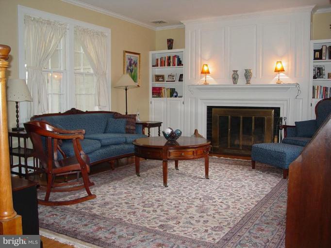 7007 Copeleigh Road Baltimore, MD 21212 - Photo 8 of 30 a living room with furniture and a fireplace