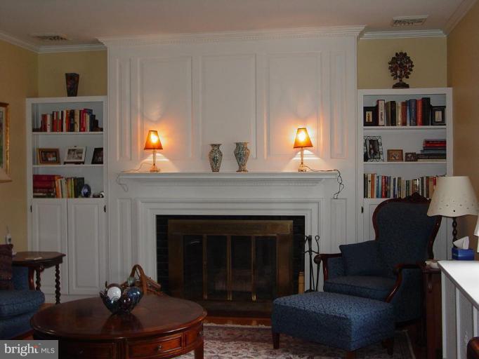 7007 Copeleigh Road Baltimore, MD 21212 - Photo 9 of 30 a living room with furniture and a fireplace