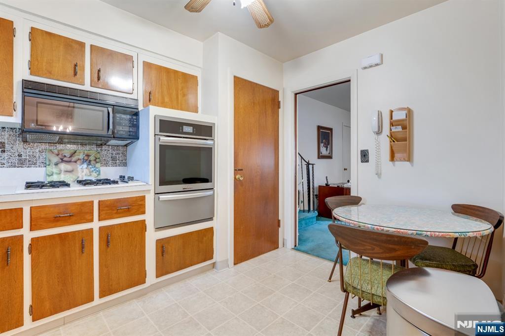 378 Lookout Avenue Hackensack, NJ 07601 - Photo 11 of 32 a room with furniture cabinets and a window