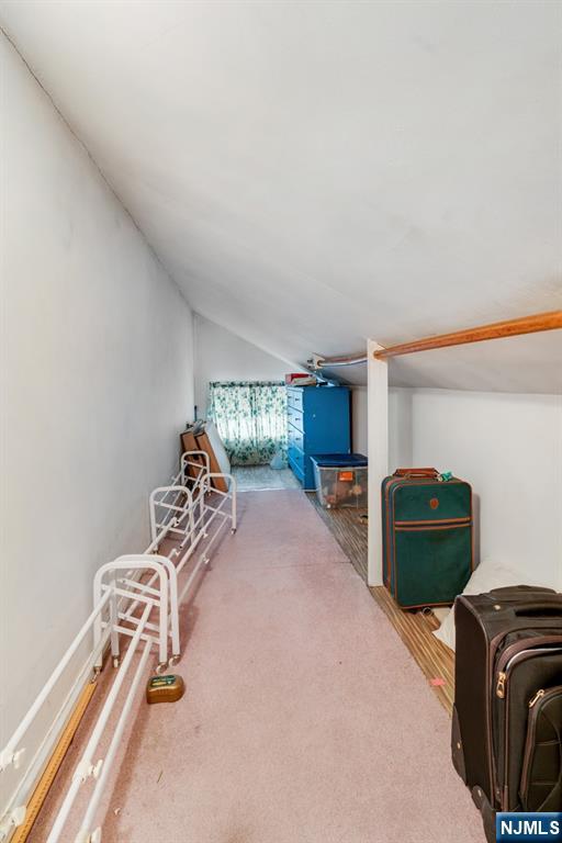 378 Lookout Avenue Hackensack, NJ 07601 - Photo 15 of 32 a bedroom with a bed and a mirror