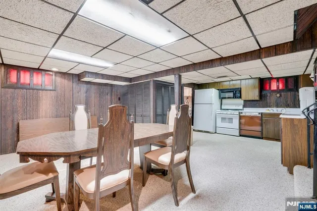 a picture of a wall with a white wall and a painting