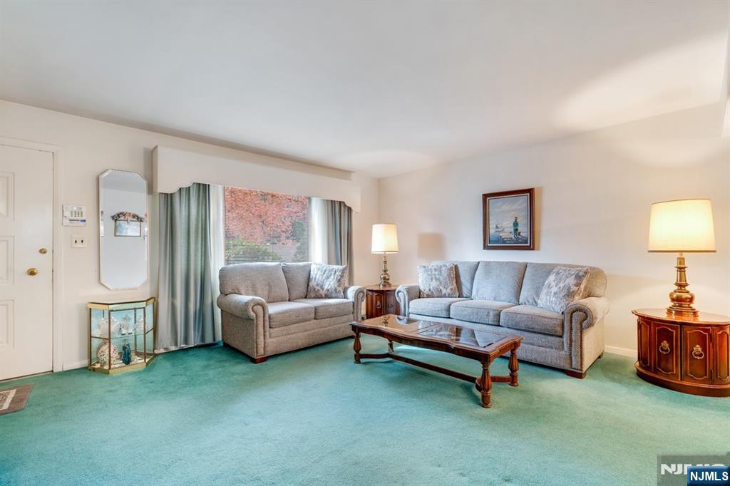 378 Lookout Avenue Hackensack, NJ 07601 - Photo 4 of 32 a living room with furniture and a window