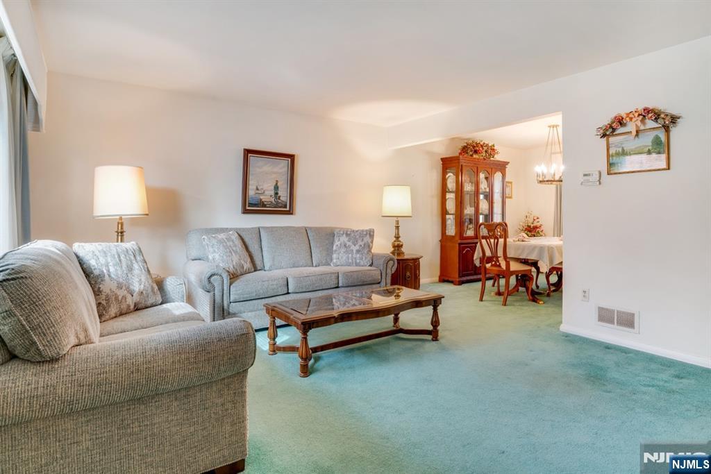 378 Lookout Avenue Hackensack, NJ 07601 - Photo 5 of 32 a living room with furniture and a couch