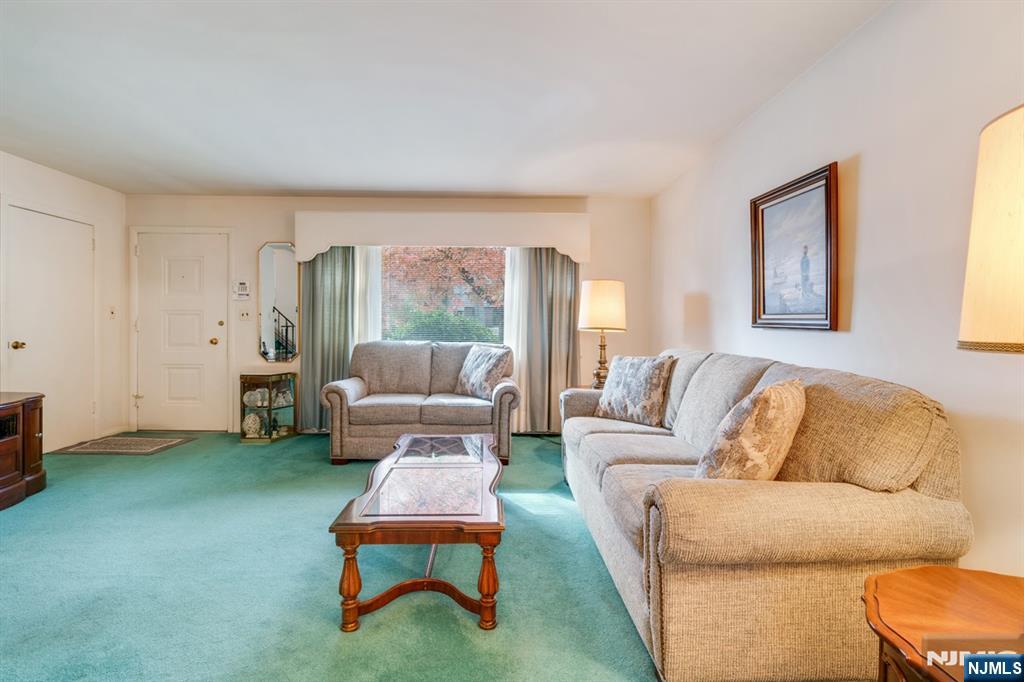 378 Lookout Avenue Hackensack, NJ 07601 - Photo 7 of 32 a living room with furniture and a gym