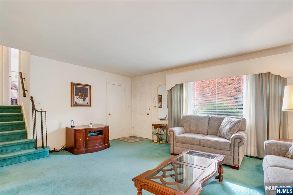 378 Lookout Avenue Hackensack, NJ 07601 - Photo 8 of 32 a living room with furniture and a window