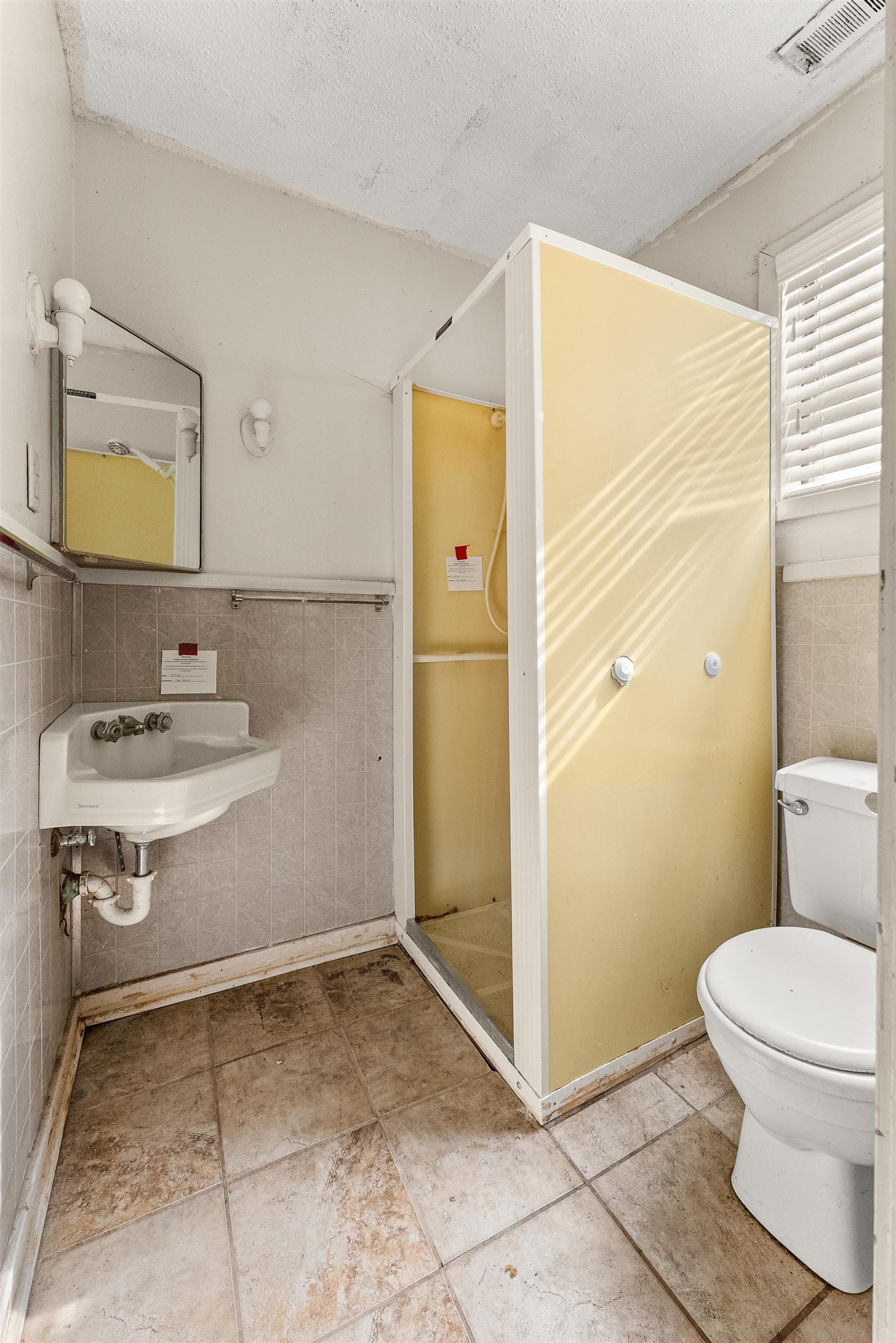 61 Bridge Road Coahoma, MS 38617 - Photo 14 of 27 a bathroom with a sink toilet and shower