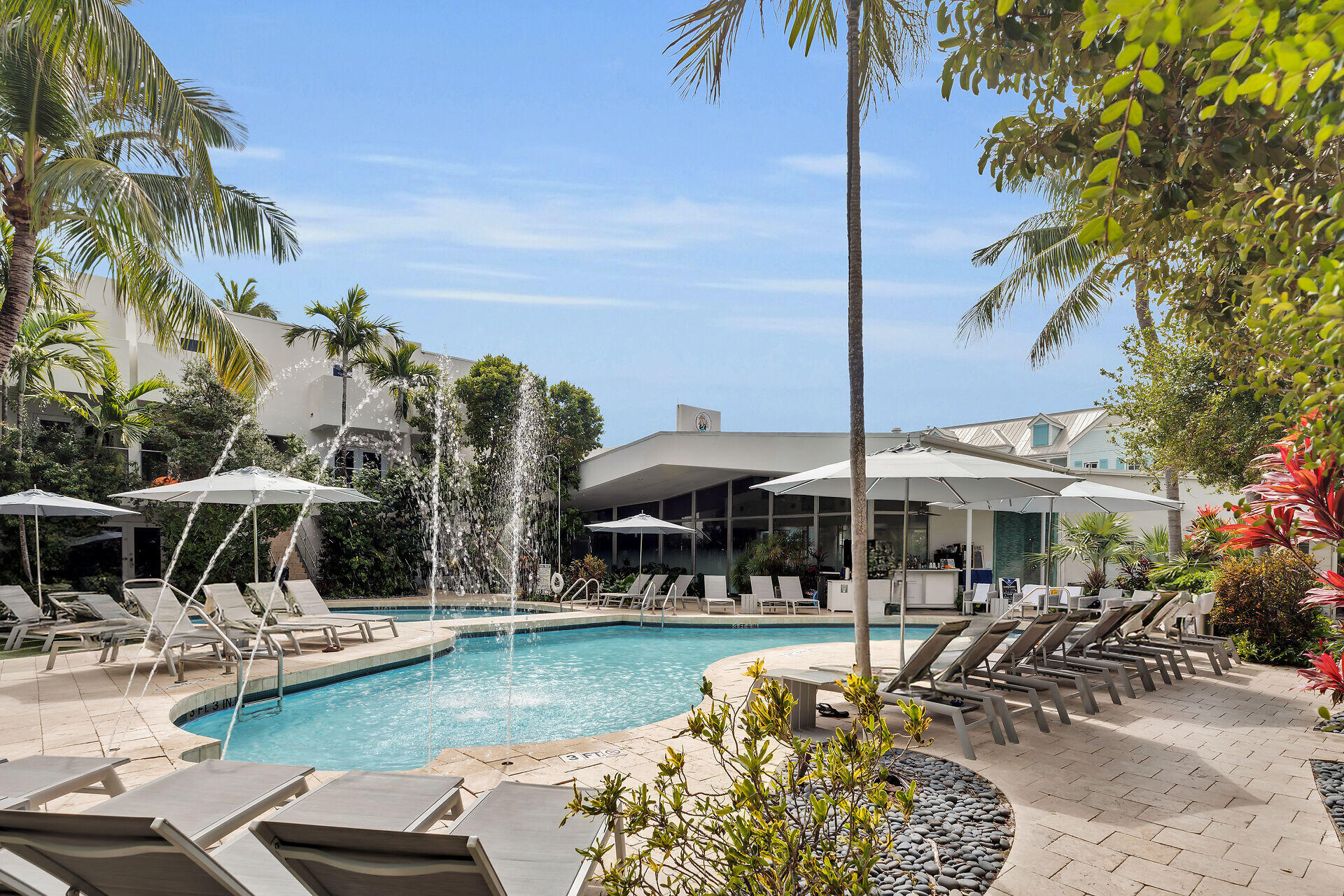 1401 Simonton Street, Unit 16 Key West, FL 33040 - Photo 19 of 29 a view of swimming pool with outdoor seating and plants