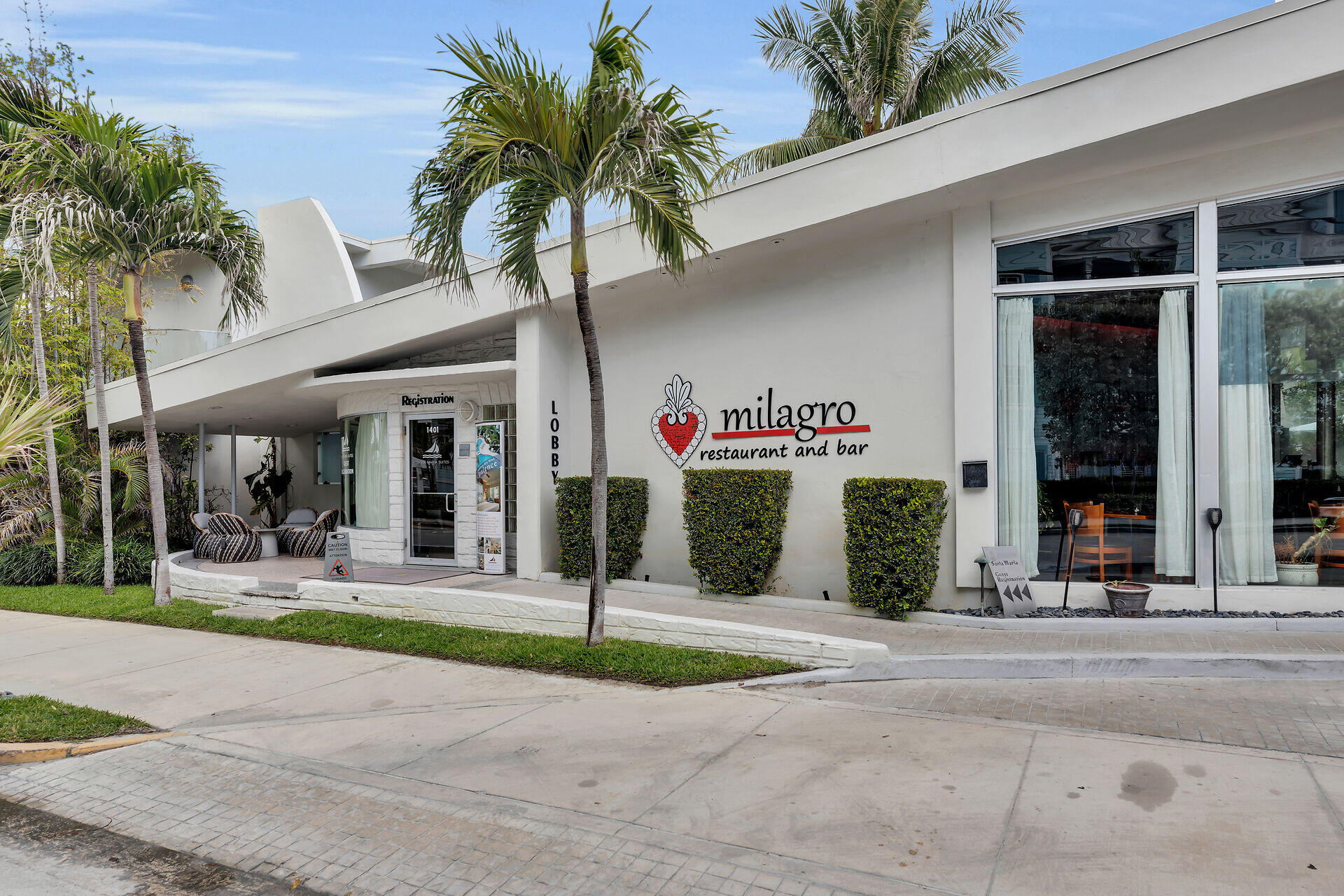 1401 Simonton Street, Unit 16 Key West, FL 33040 - Photo 22 of 29 a palm tree in front of a building