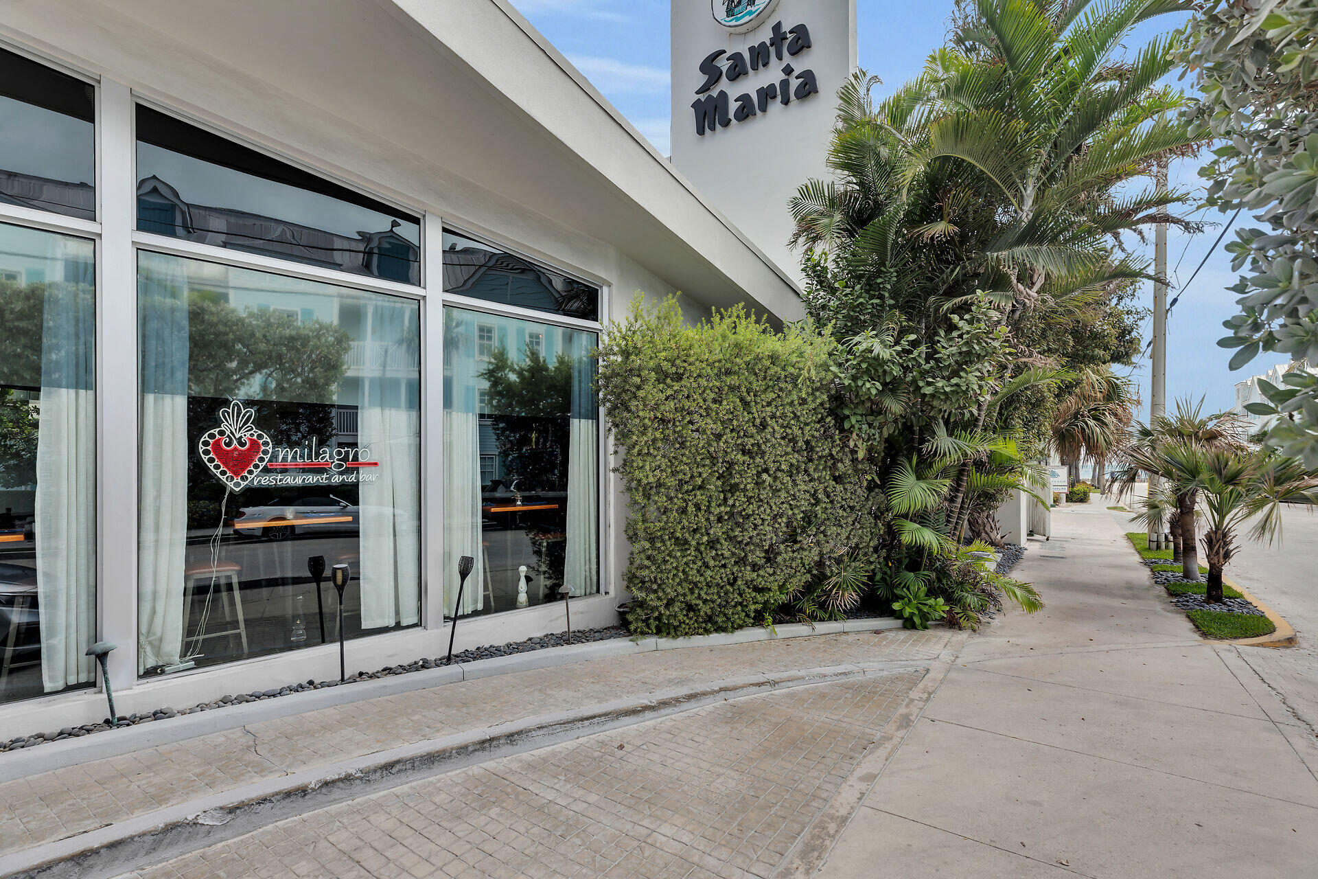 1401 Simonton Street, Unit 16 Key West, FL 33040 - Photo 23 of 29 a couple of potted plants in front of a building