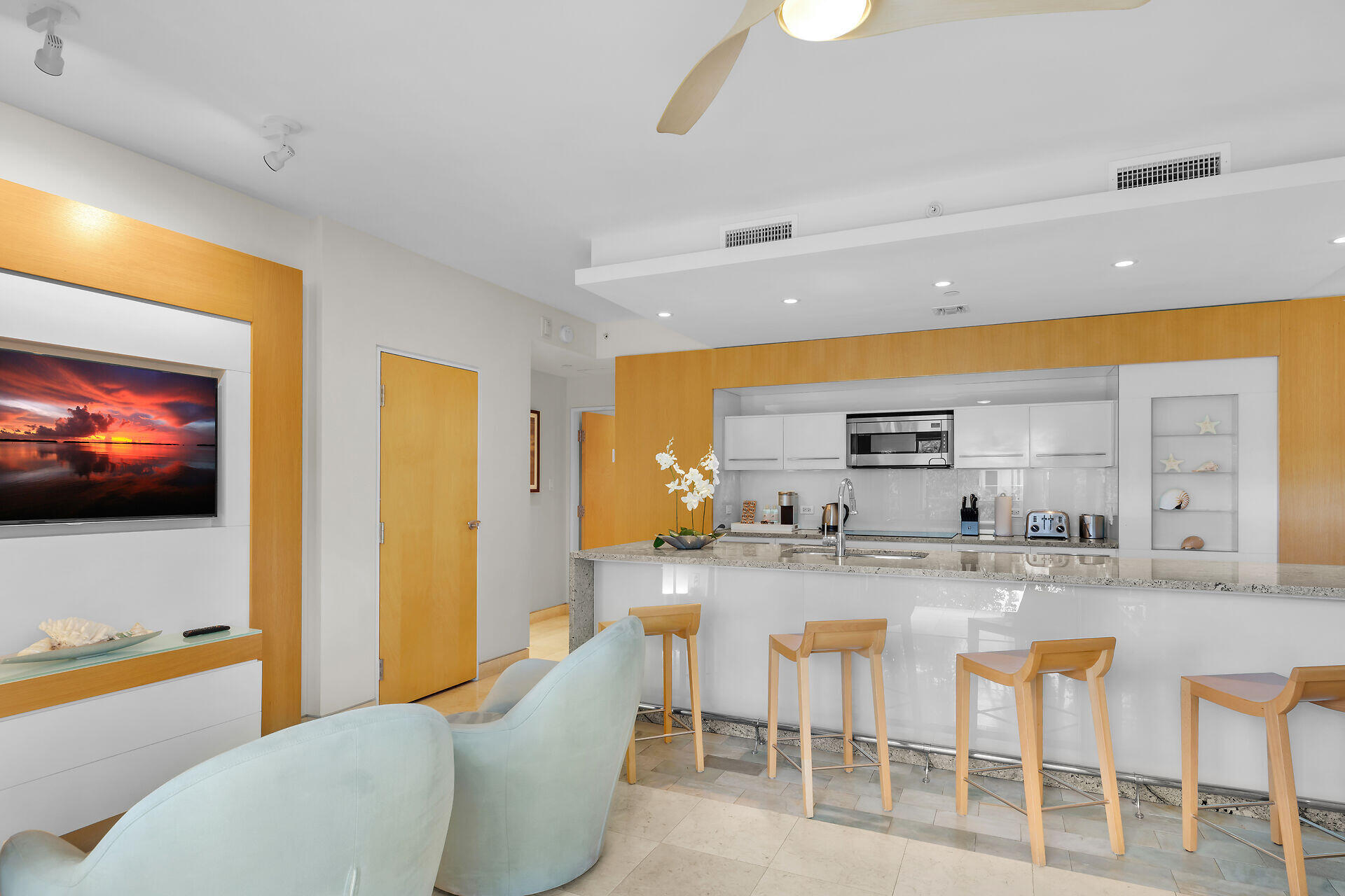 1401 Simonton Street, Unit 16 Key West, FL 33040 - Photo 8 of 29 a large kitchen with a table and chairs