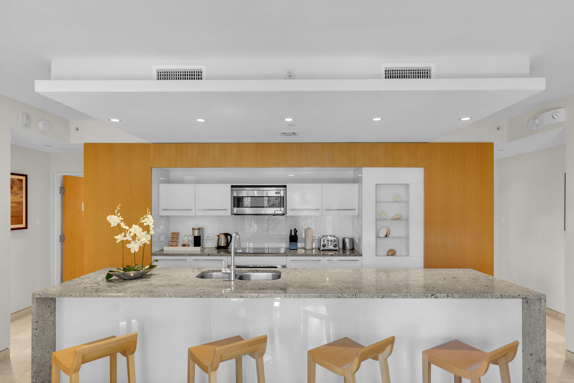 1401 Simonton Street, Unit 16 Key West, FL 33040 - Photo 9 of 29 a kitchen with a sink and a refrigerator