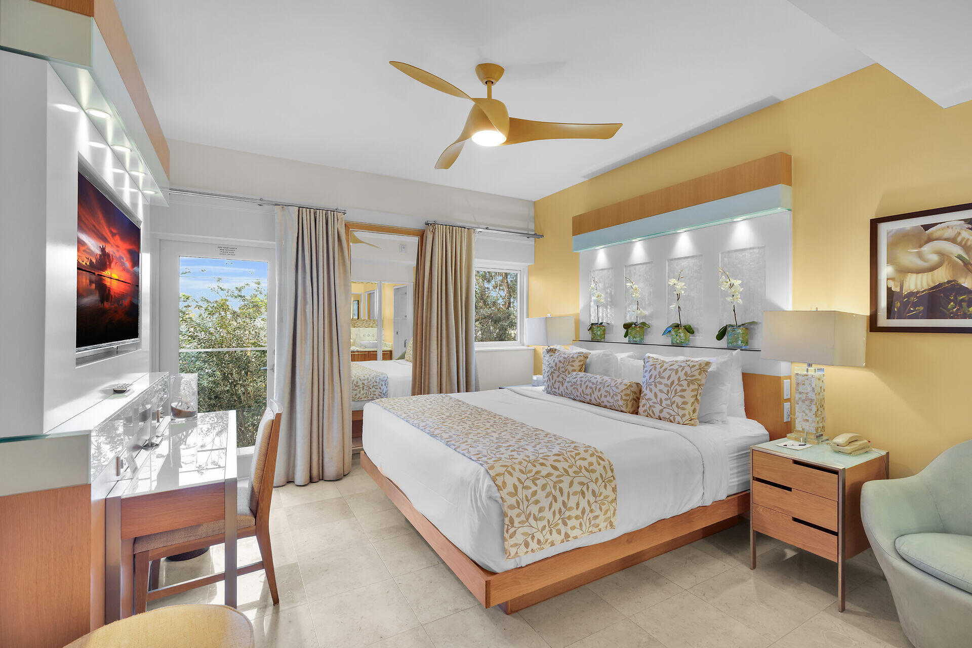 1401 Simonton Street, Unit 16 Key West, FL 33040 - Photo 10 of 29 a living room with furniture fireplace and a flat screen tv