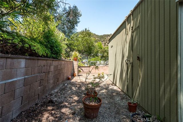 a house with yard in front of it