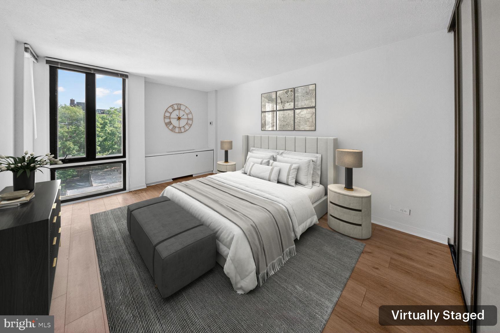 490 M Street Southwest, Unit W505 Washington, DC 20024 - Photo 8 of 18 a bedroom with a large bed and a window