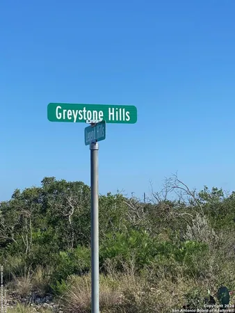 a sign that is sitting on a wall
