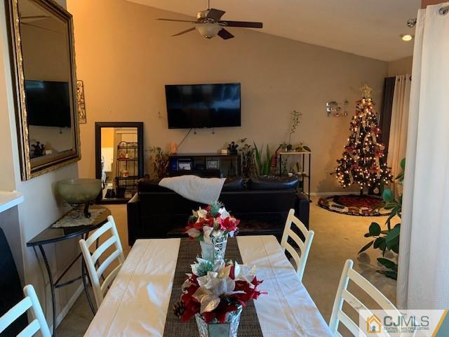 730 Edpas Road New Brunswick, NJ 08901 - Photo 3 of 8 a living room with furniture and a flat screen tv