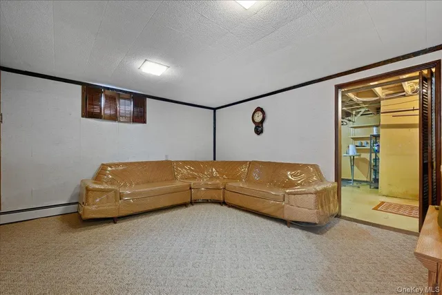 a view of a patio with table and chairs potted plants