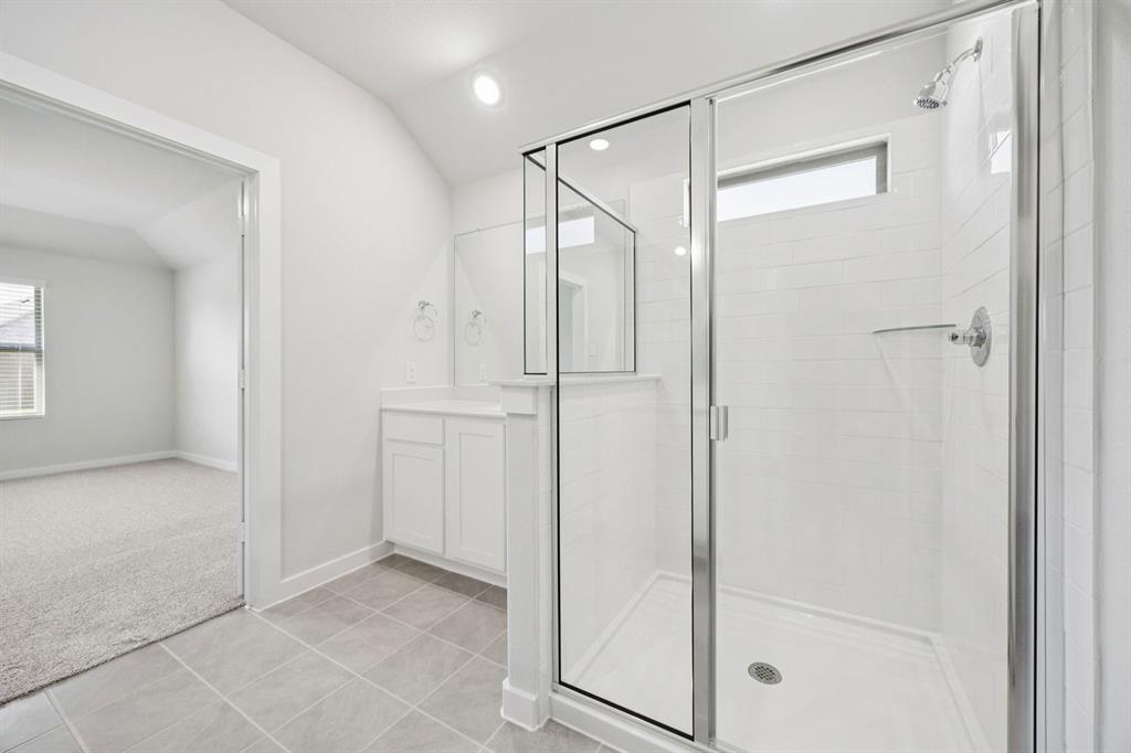 5721 Rushing River Way McKinney, TX 75071 - Photo 20 of 29 Primary Bathroom in the Heisman home plan by Trophy Signature Homes – REPRESENTATIVE PHOTO