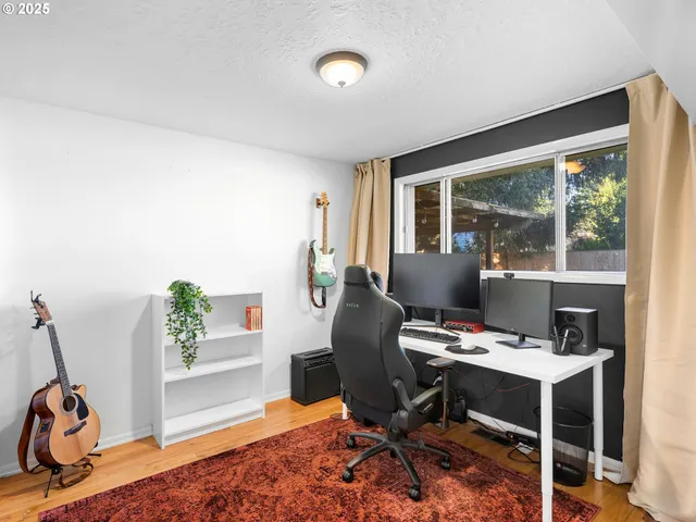 a workspace with furniture and a window