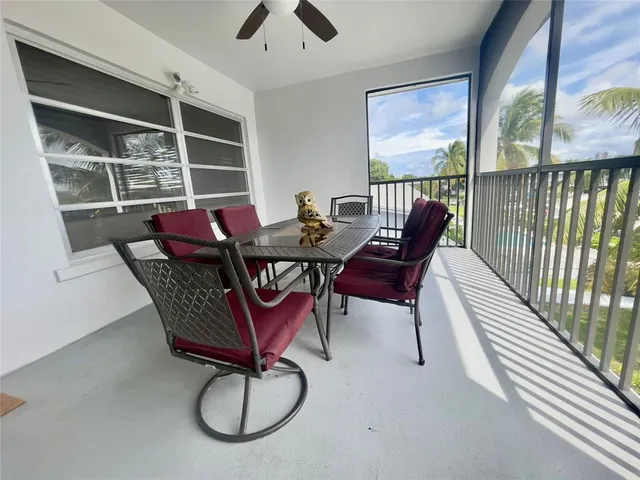 a view of a livingroom with furniture and window