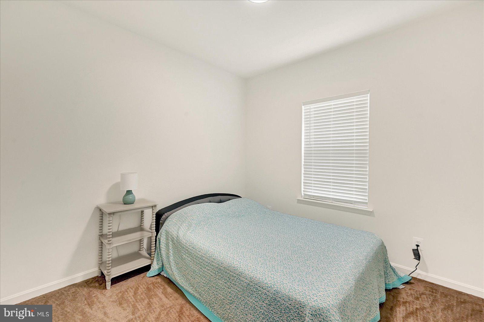 65 Chase Circle Elkton, MD 21921 - Photo 18 of 31 a bedroom with a bed and a window