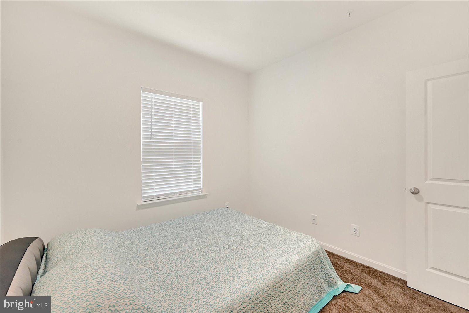 65 Chase Circle Elkton, MD 21921 - Photo 19 of 31 a room with a bed and a window