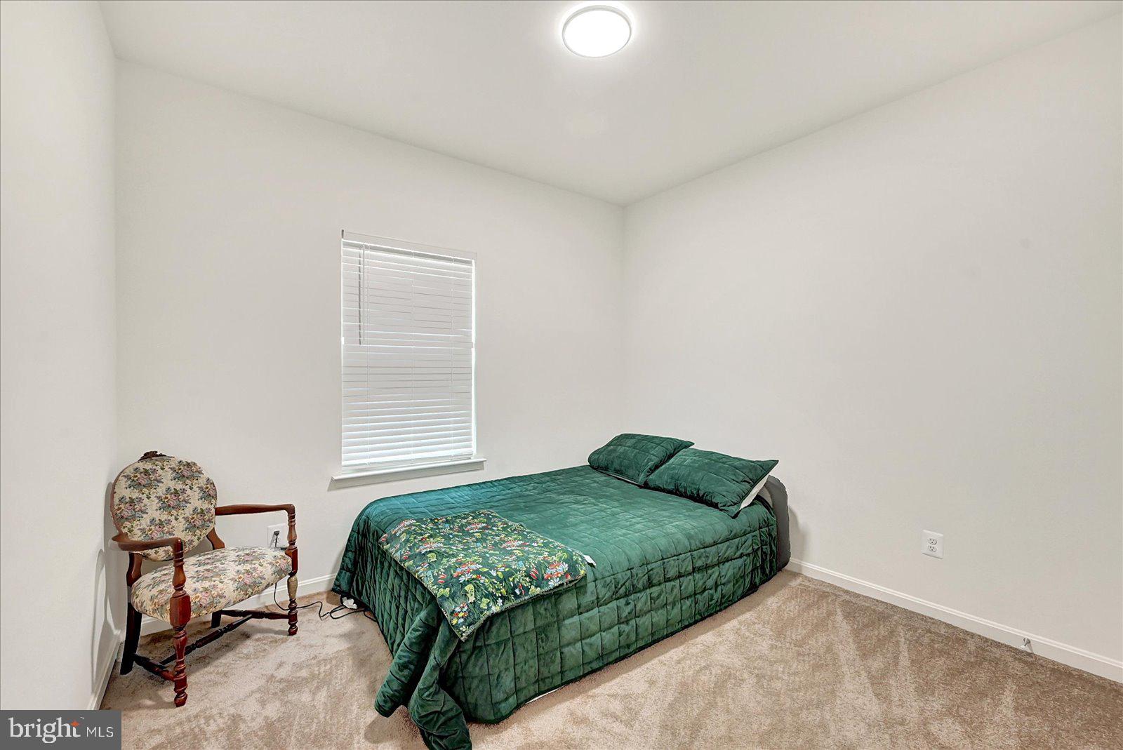 65 Chase Circle Elkton, MD 21921 - Photo 21 of 31 a bedroom with a bed and a window