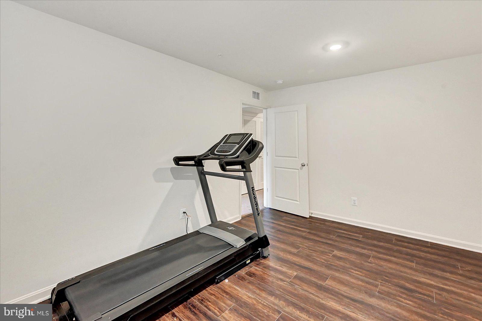 65 Chase Circle Elkton, MD 21921 - Photo 26 of 31 a view of room with wooden floor