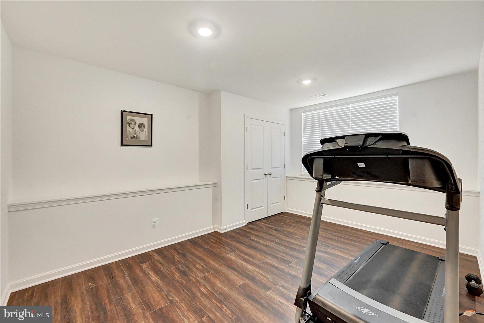 65 Chase Circle Elkton, MD 21921 - Photo 27 of 31 a view of a hallway with wooden floor