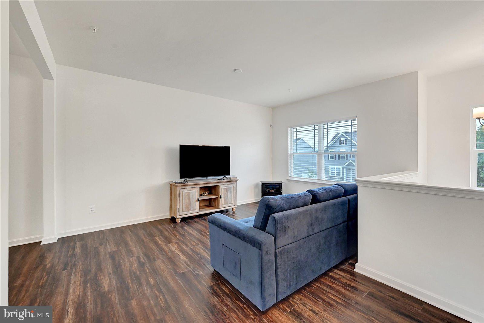 65 Chase Circle Elkton, MD 21921 - Photo 4 of 31 a living room with furniture and a flat screen tv