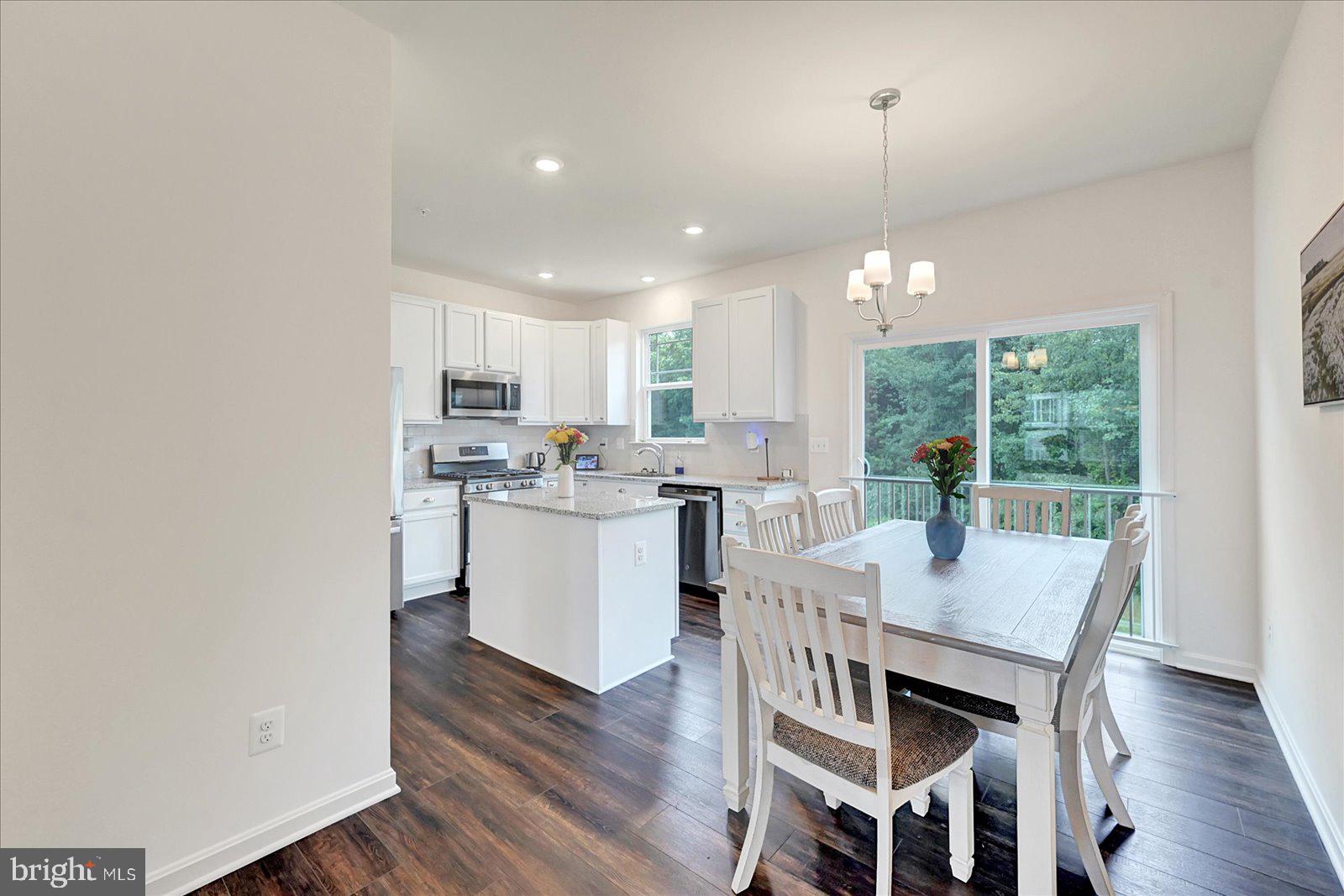 65 Chase Circle Elkton, MD 21921 - Photo 6 of 31 a view of a dining room with furniture window and wooden floor