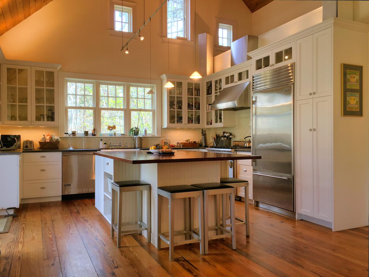 58 Slough Pond Road Truro, MA 02666 - Photo 14 of 30 a kitchen with a sink appliances and cabinets