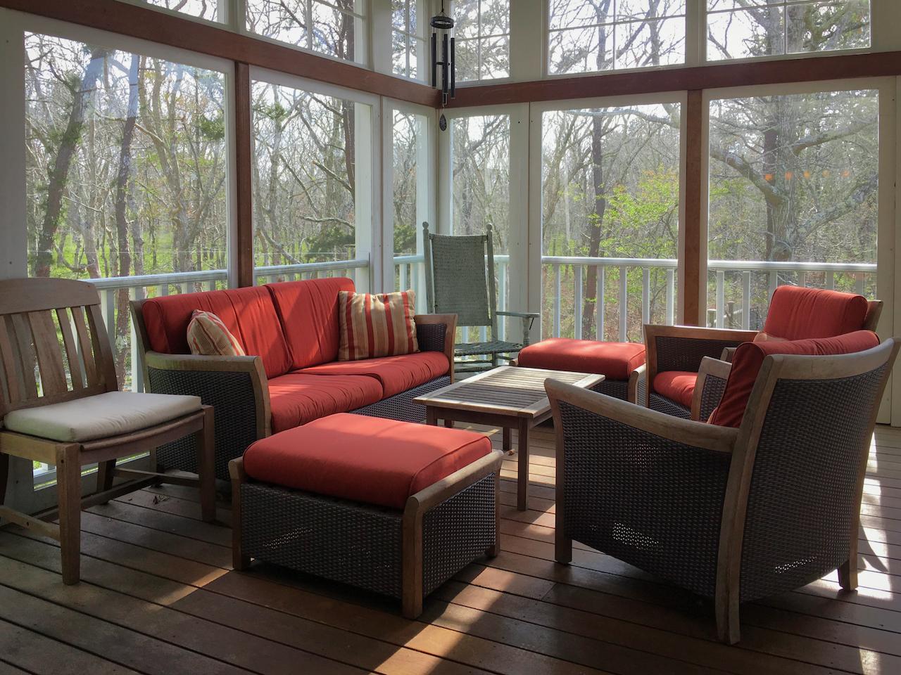 58 Slough Pond Road Truro, MA 02666 - Photo 16 of 30 a living room with furniture and a floor to ceiling window