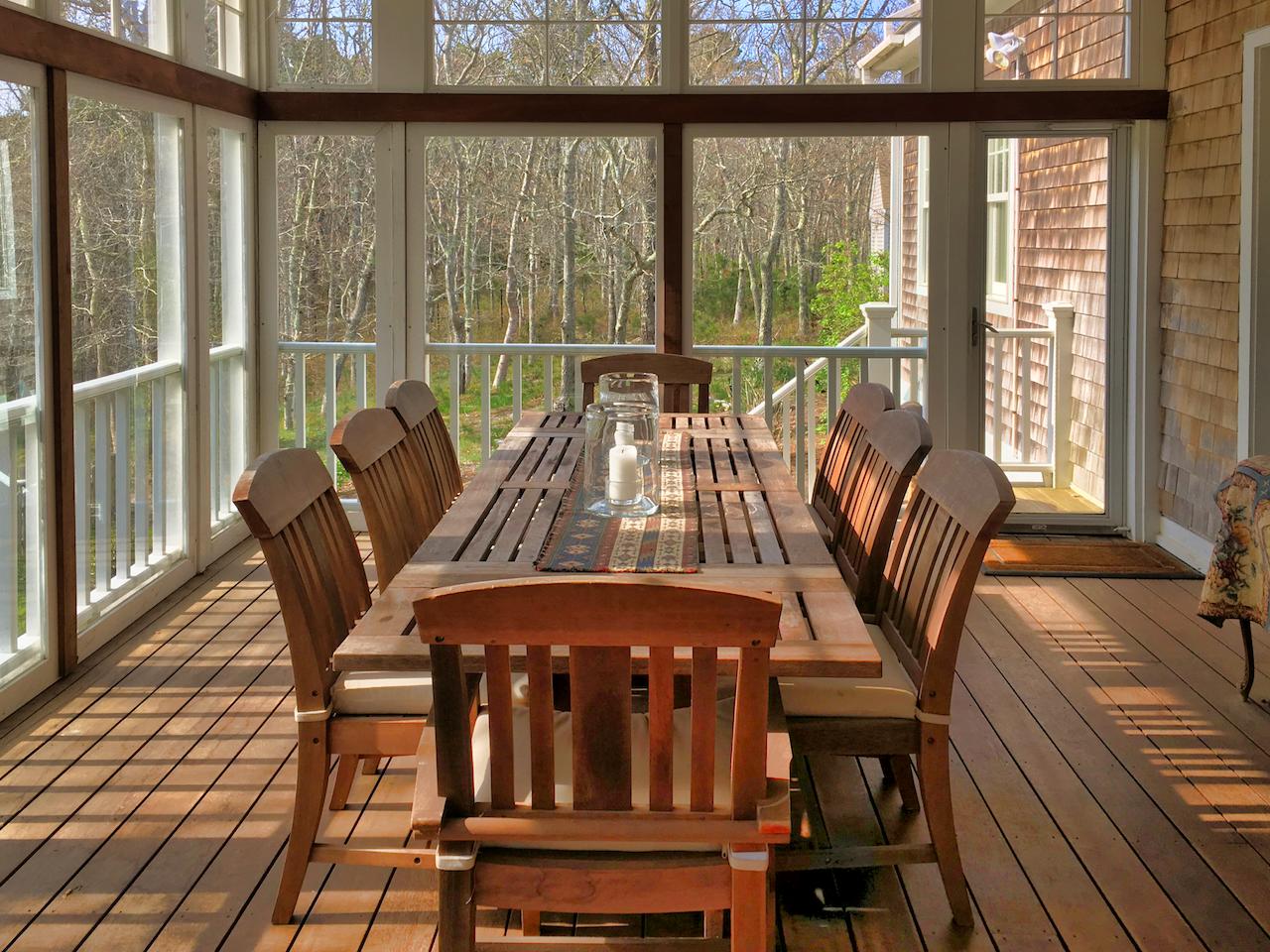58 Slough Pond Road Truro, MA 02666 - Photo 18 of 30 a view of a dining room with furniture window and outside view