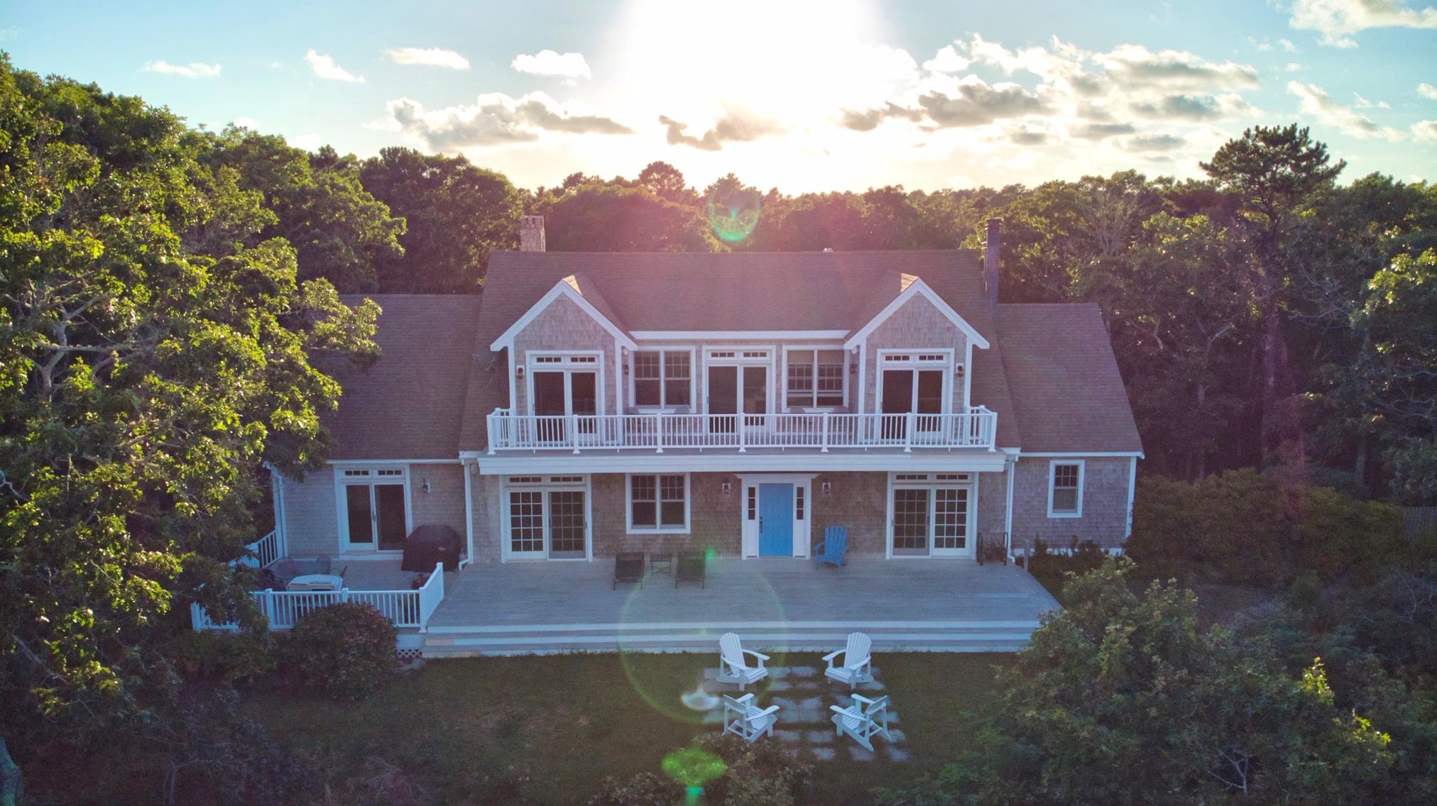 58 Slough Pond Road Truro, MA 02666 - Photo 2 of 30 front view of a house with a yard