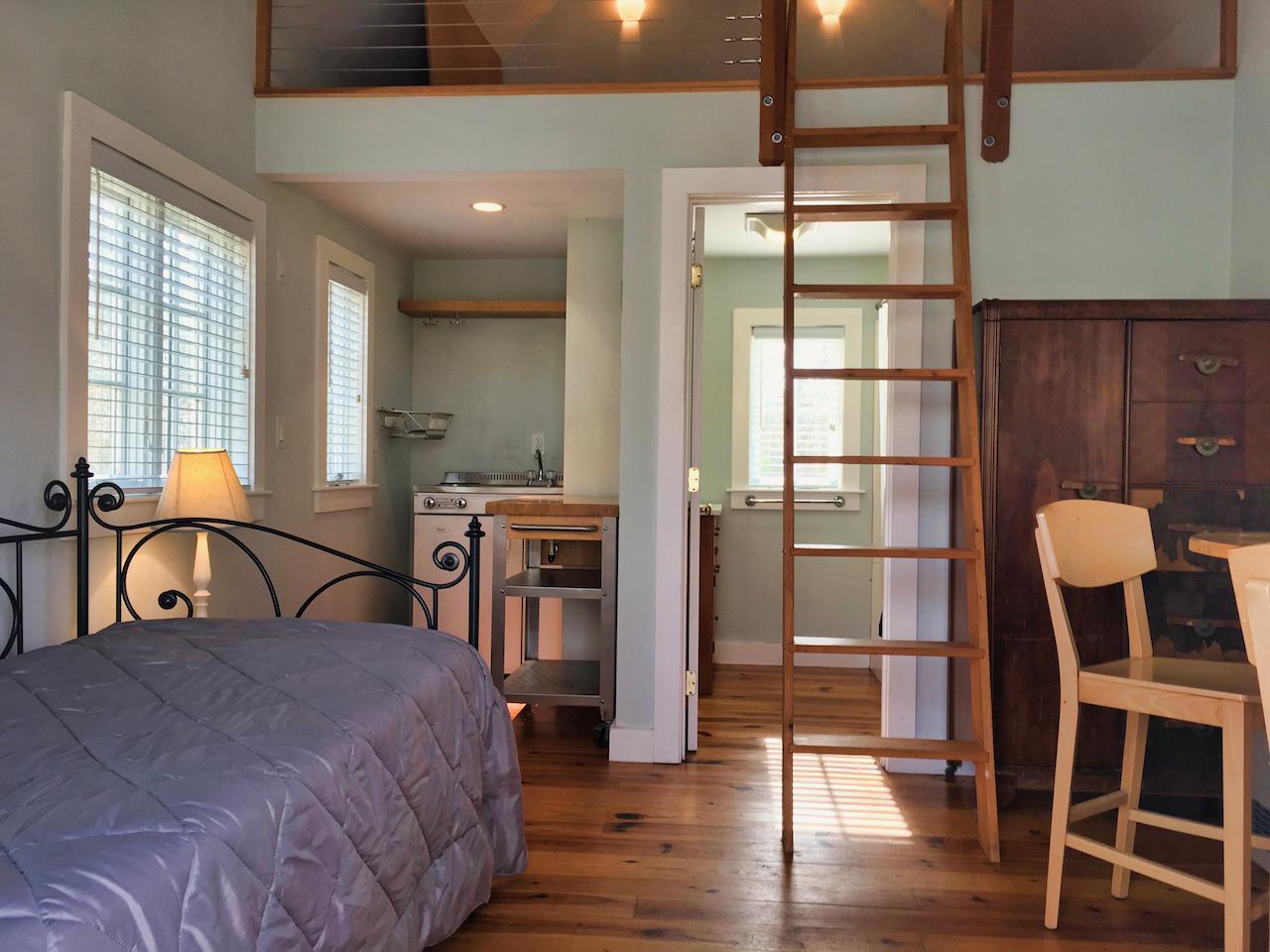 58 Slough Pond Road Truro, MA 02666 - Photo 26 of 30 a bedroom with furniture and window