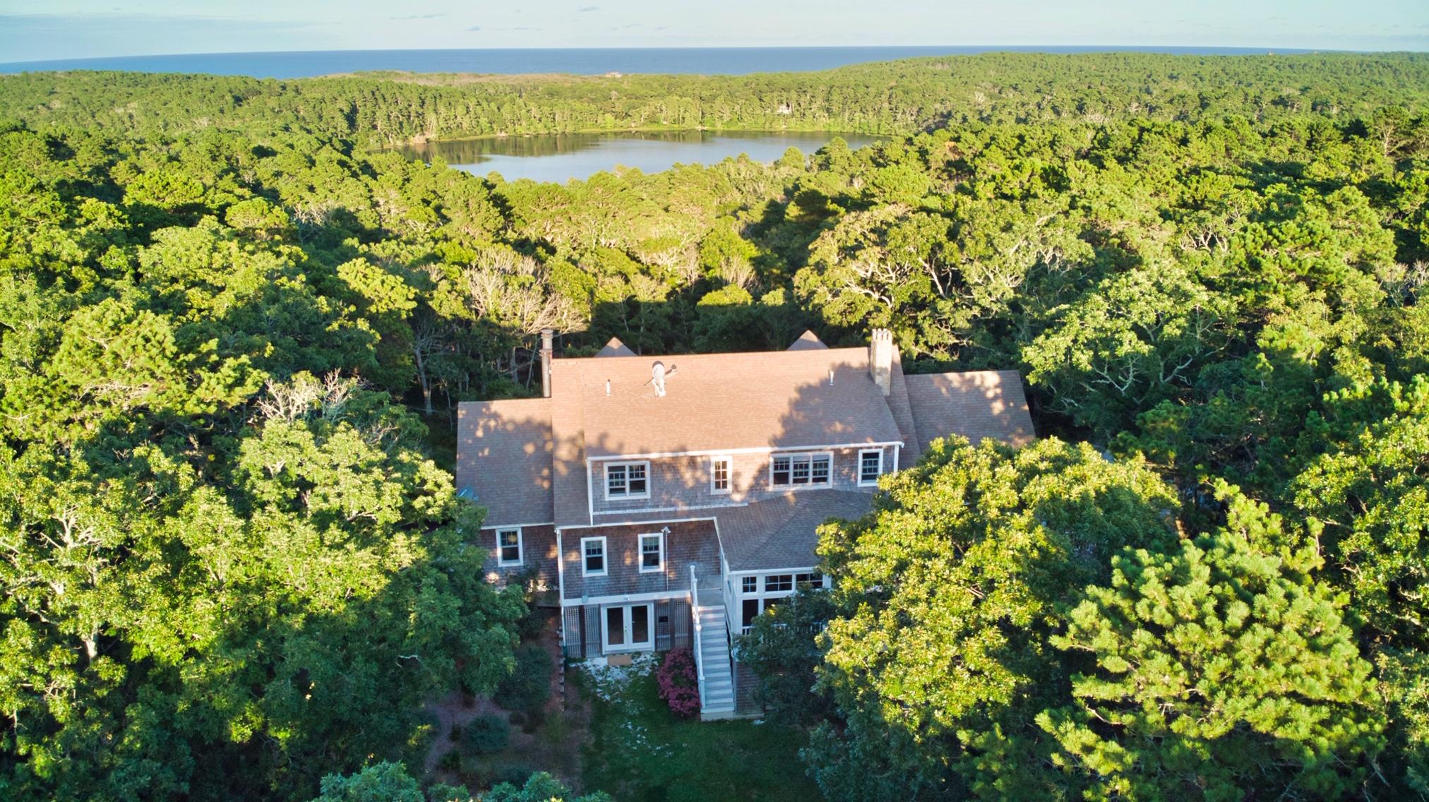 58 Slough Pond Road Truro, MA 02666 - Photo 3 of 30 a view of a city with plants