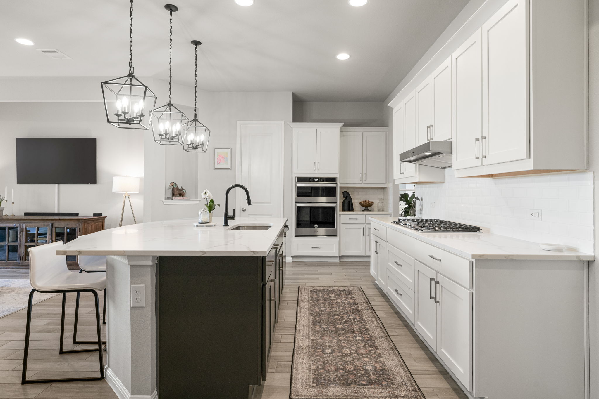 546 Hazy Hills Loop Dripping Springs, TX 78620 - Photo 17 of 40 Thoughtful finishes and a light color palette create a warm and inviting atmosphere.