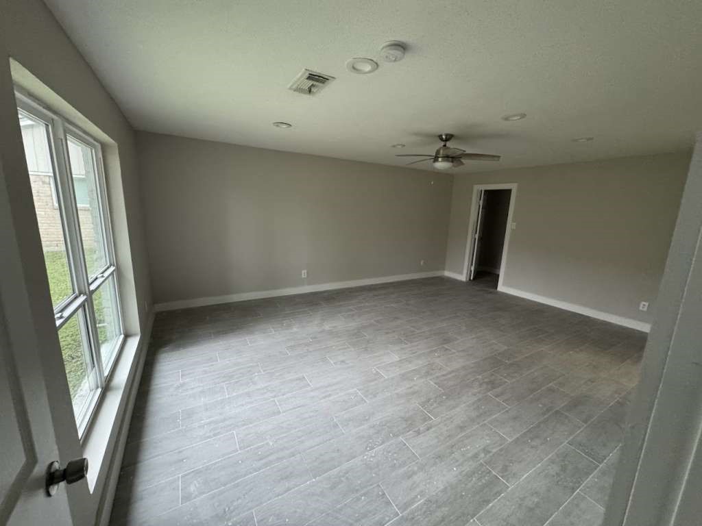 529 Brandon Road Conroe, TX 77302 - Photo 11 of 16 an empty room with windows
