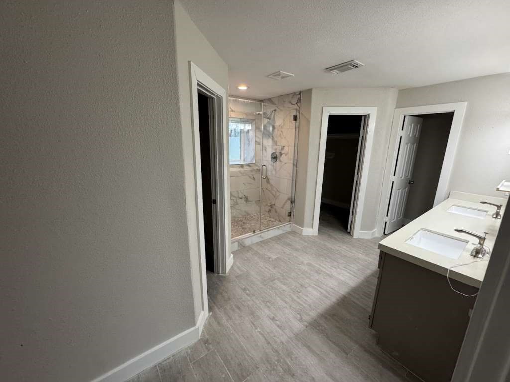 529 Brandon Road Conroe, TX 77302 - Photo 13 of 16 a view of hallway with wooden floor