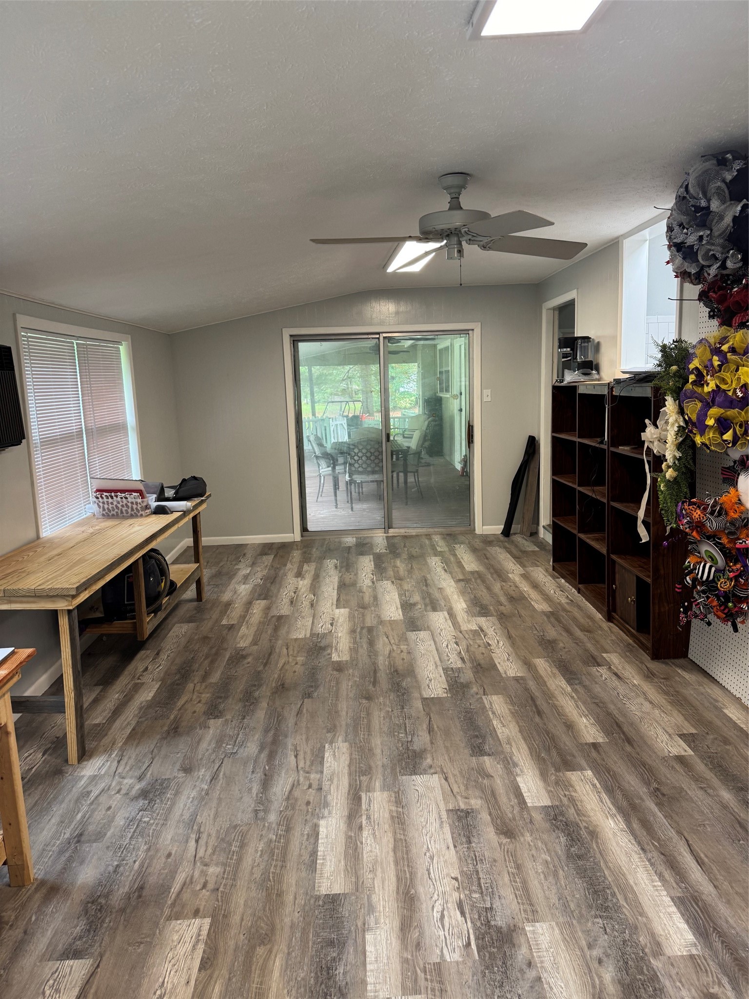 9004 Farm To Market 62 Corrigan, TX 75939 - Photo 15 of 27 a room with furniture and a wooden floor
