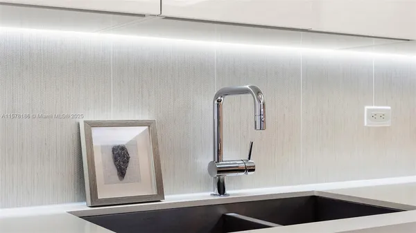 a close view of light fixtures and staircase