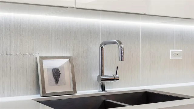 a close view of light fixtures and staircase