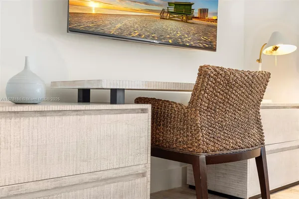 a bed room with a bed and a lamp