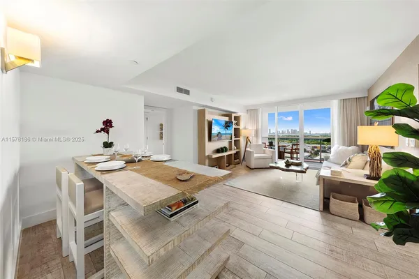 a living room with furniture and a table
