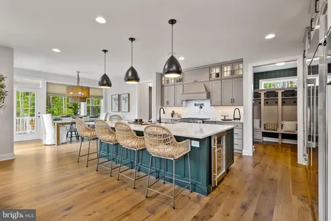 a open kitchen with stainless steel appliances granite countertop a stove and cabinets
